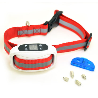 White electric shock dog training collar with LCD screen , gray reflective strap, and included accessories: blue contact cleaner tool & 4 metal electrode replacements.?