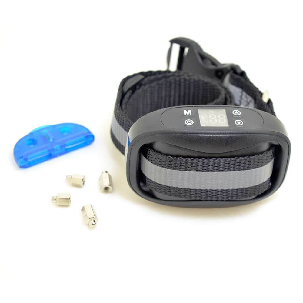 Black electric shock dog training collar with LCD screen, gray reflective strap, and included accessories: blue contact cleaner tool & 4 metal electrode replacements.?